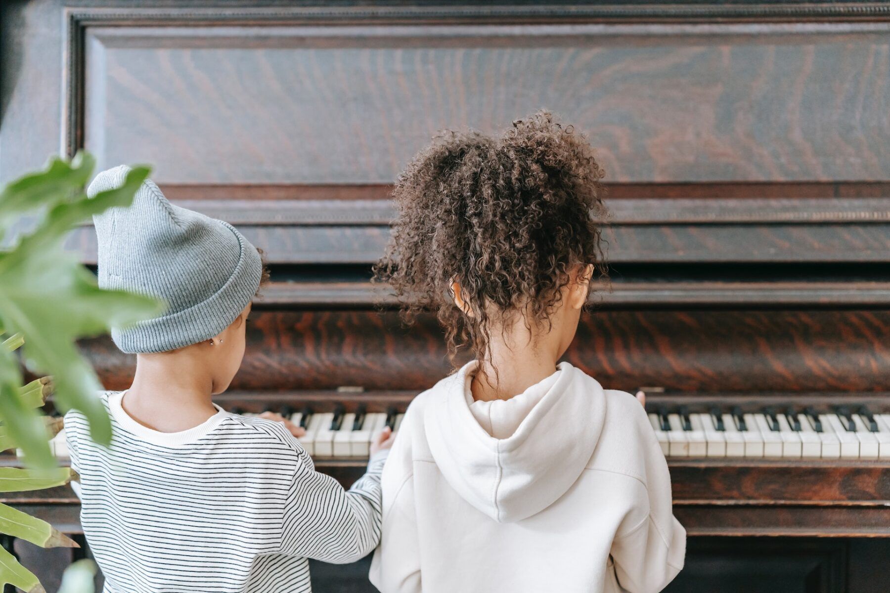 Kids playing piano